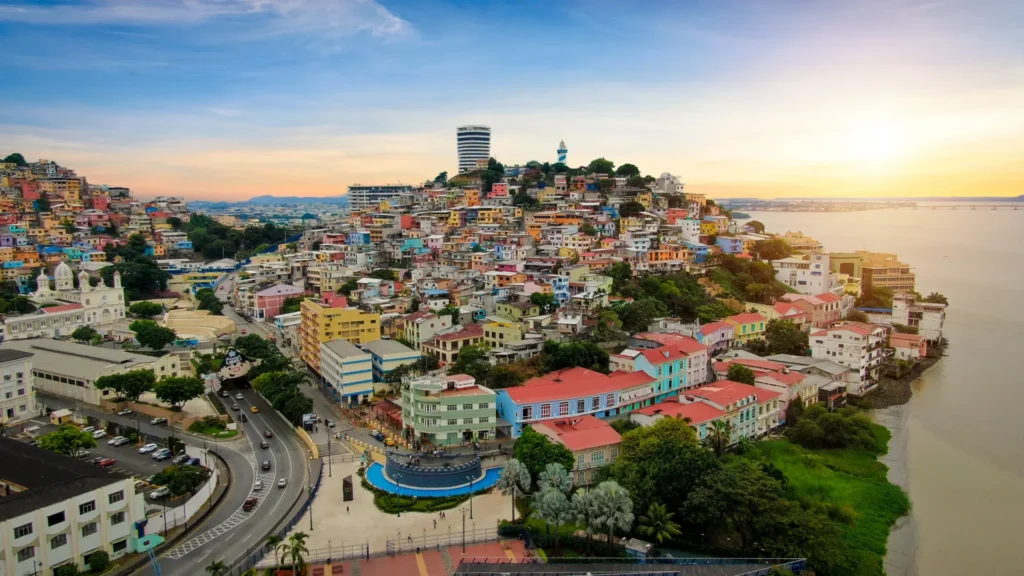 Ecuador Diverse Landscapes – Budget Trip A colorful colonial street market in Ecuador, highlighting diverse terrains for cheap places to travel.