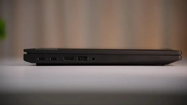 Side view of the Lenovo ThinkPad T14 highlighting the full-size RJ45 Ethernet, HDMI, and dual Thunderbolt 4 ports. lenovo-thinkpad-t14-ports-ethernet-thunderbolt-4