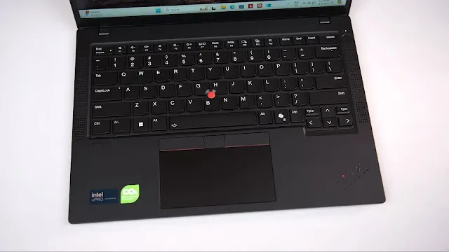 Close-up of the award-winning ThinkPad T14 keyboard featuring the red TrackPoint and dedicated Copilot AI key. lenovo-thinkpad-t14-spill-resistant-keyboard-trackpoint